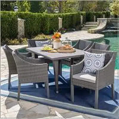 Arcadia Outdoor 7 Piece Wicker Rectangular Dining Set with Cushions. Grey. Silver