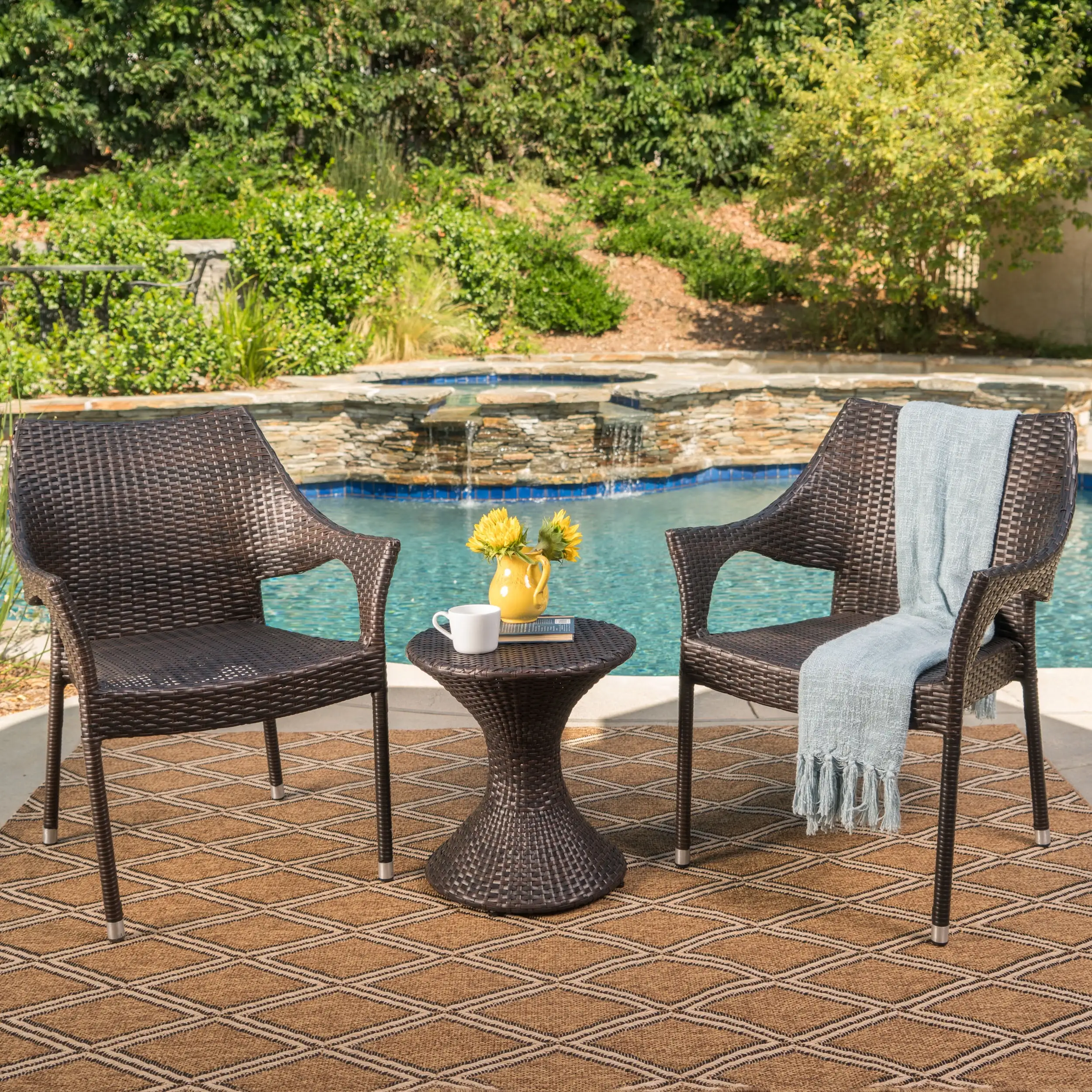 Astrid Outdoor 3 Piece Wicker Chat Set with Stacking Chairs and Hourglass Side Table. Multibrown