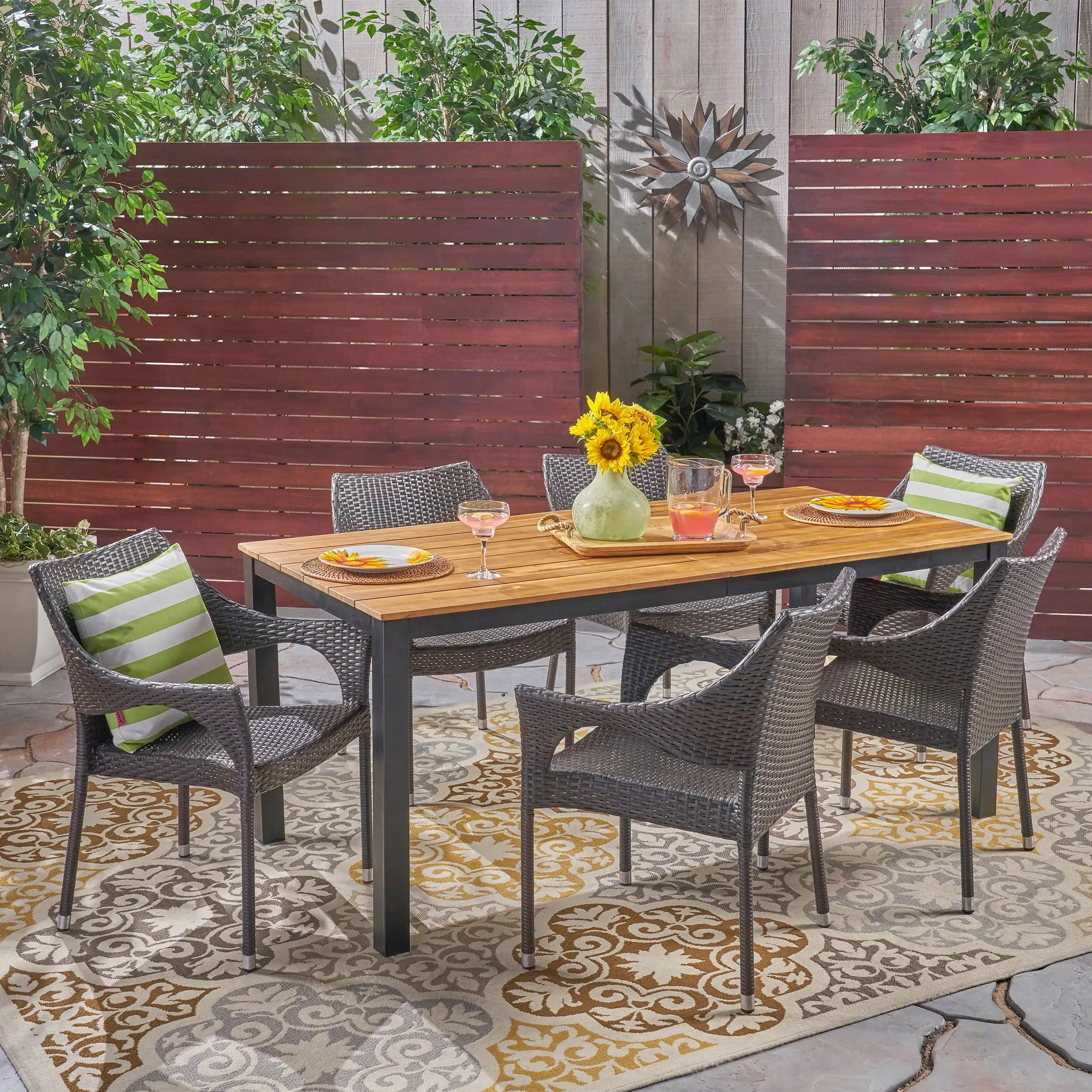 Brady Outdoor 7 Piece Acacia Wood Dining Set with Stacking Wicker Chairs. Multi Brown. Teak