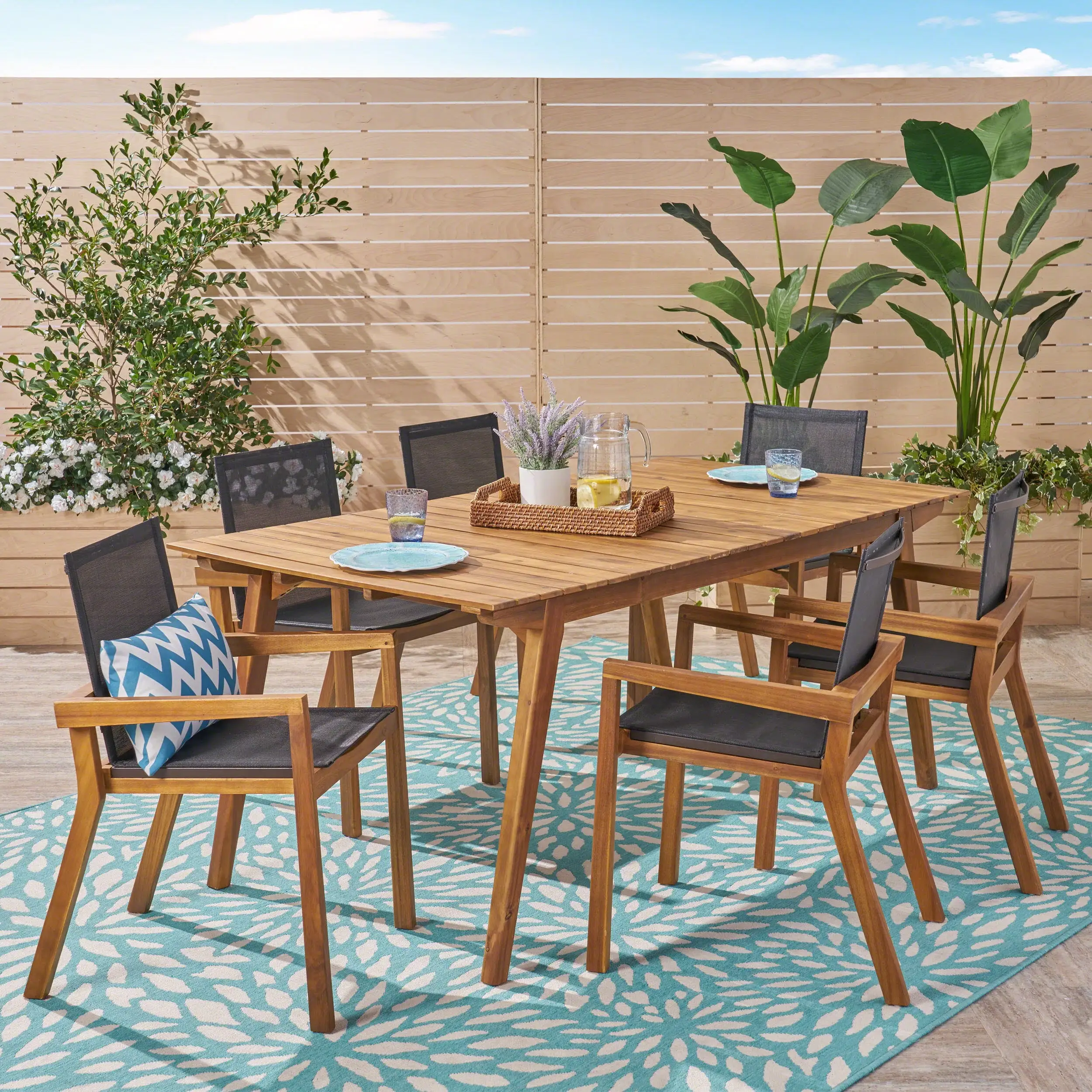 Brycen Outdoor 7 Piece Acacia Wood Dining Set with Mesh Seats. Teak. Black