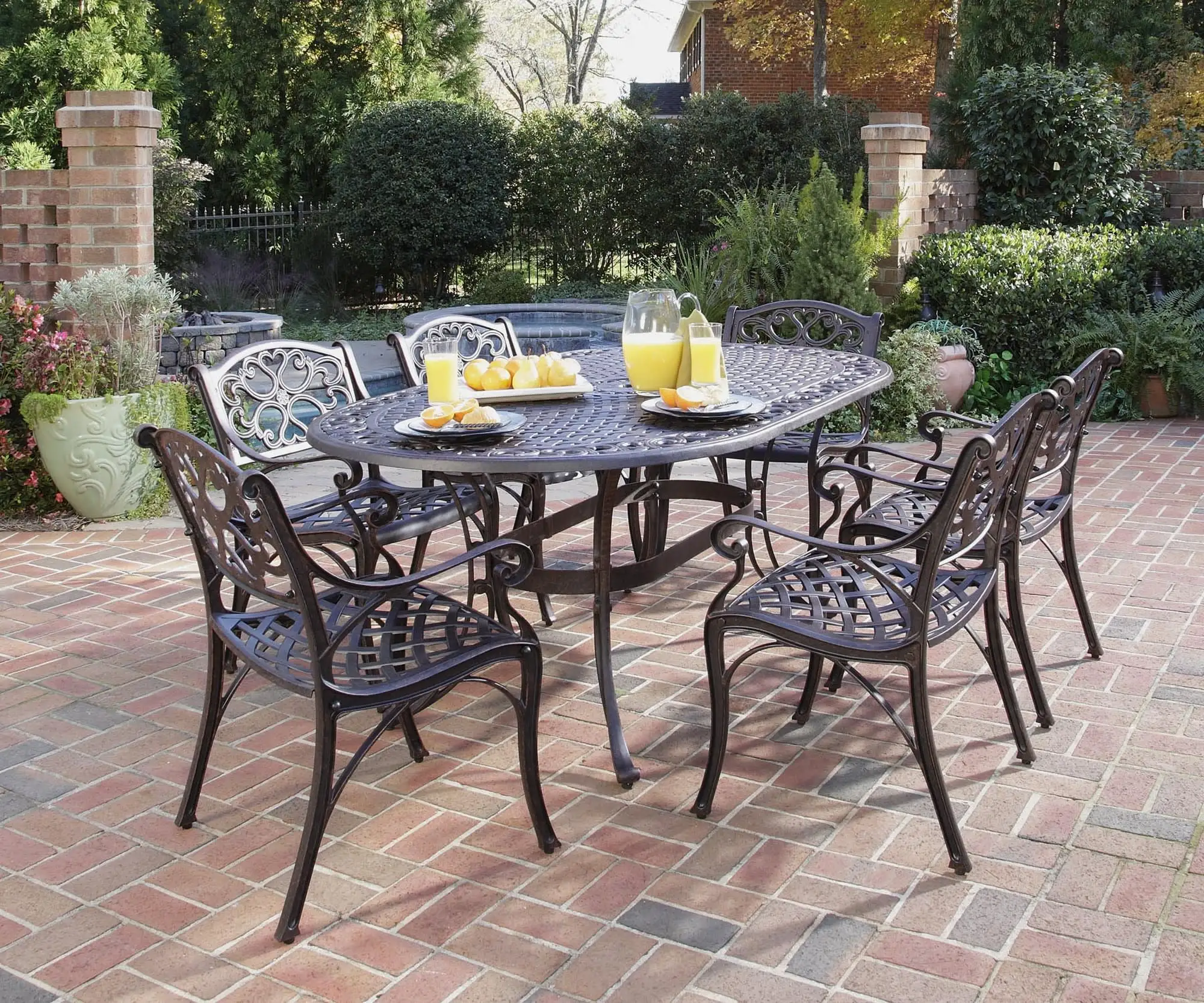 Homestyles Sanibel Aluminum 7 Piece Outdoor Dining Set in Bronze