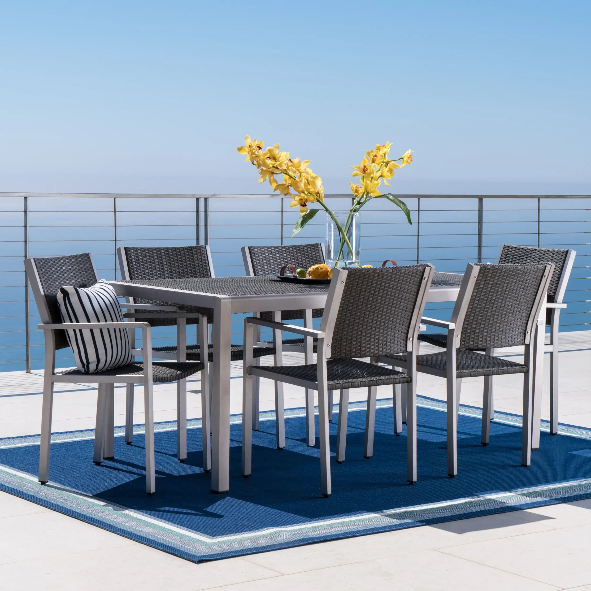 Miller Outdoor 7 Piece Aluminum Dining Set with Wicker Top. Grey