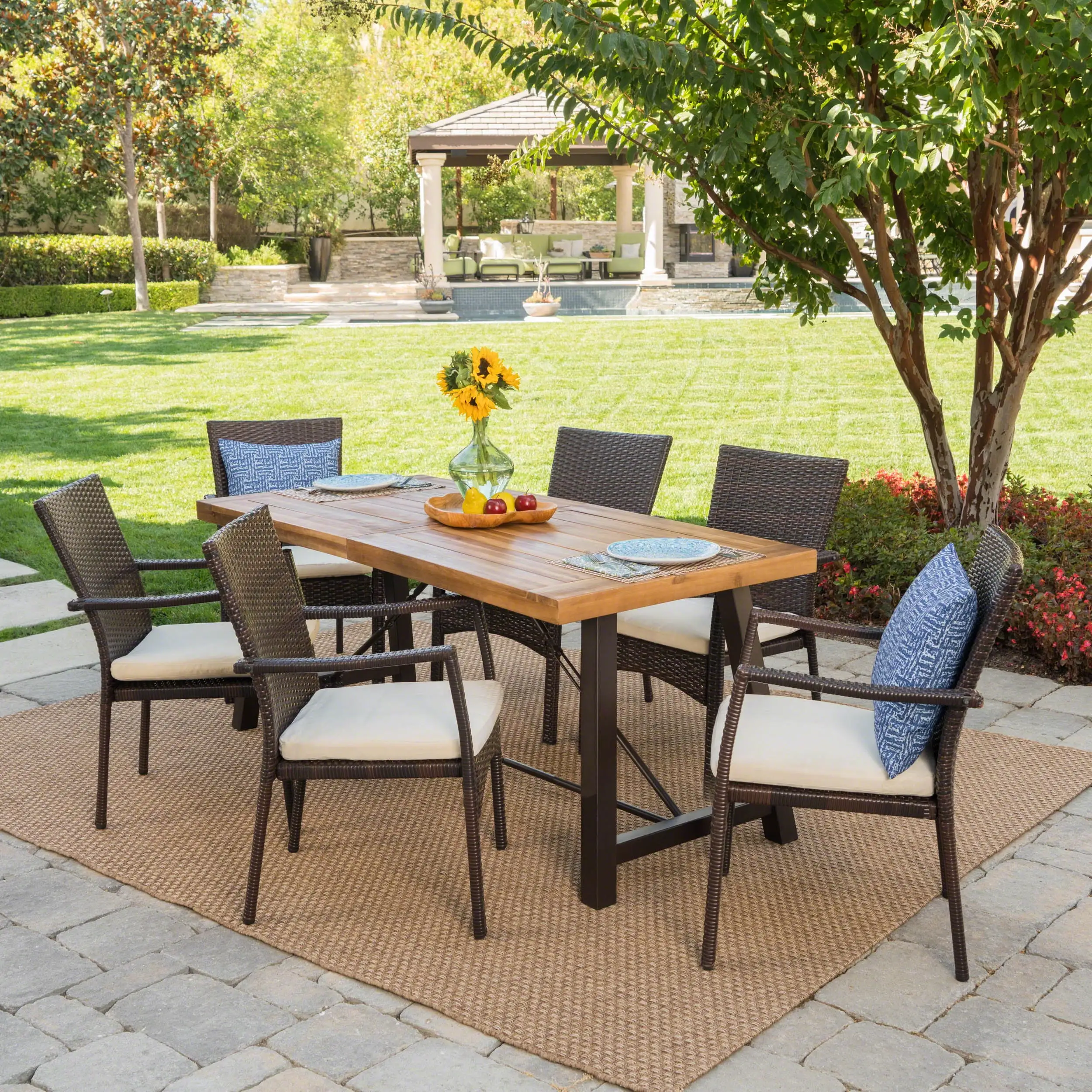 Williams Outdoor 7 Piece Dining Set with Wood Table and Wicker Dining Chairs with Cushions. Teak Finish. Brown. Crme